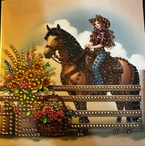Decorative card with a horse and rider design, featuring beads and intricate details.